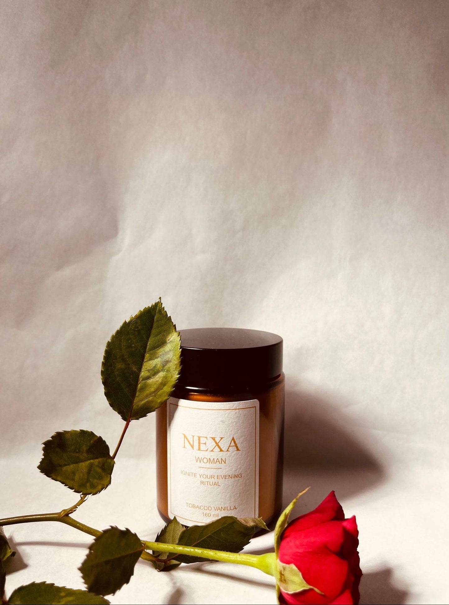 Nexa Woman brand product with rose in it