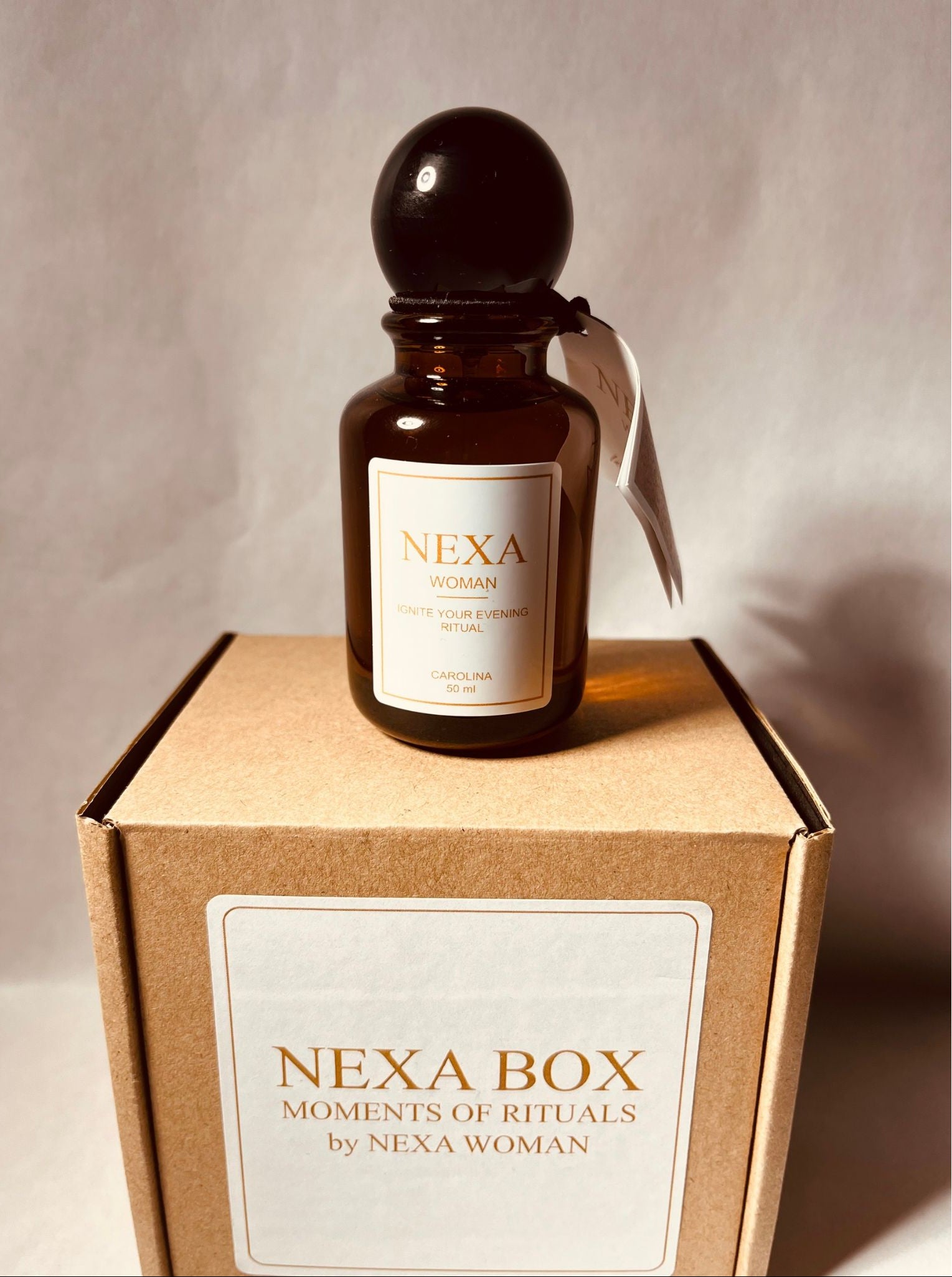 photo with parfume on nexa box